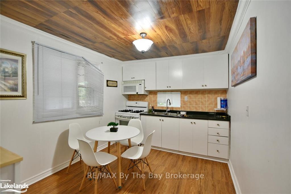 Photo 17 of 646 River Road E, Wasaga Beach — HOMEH