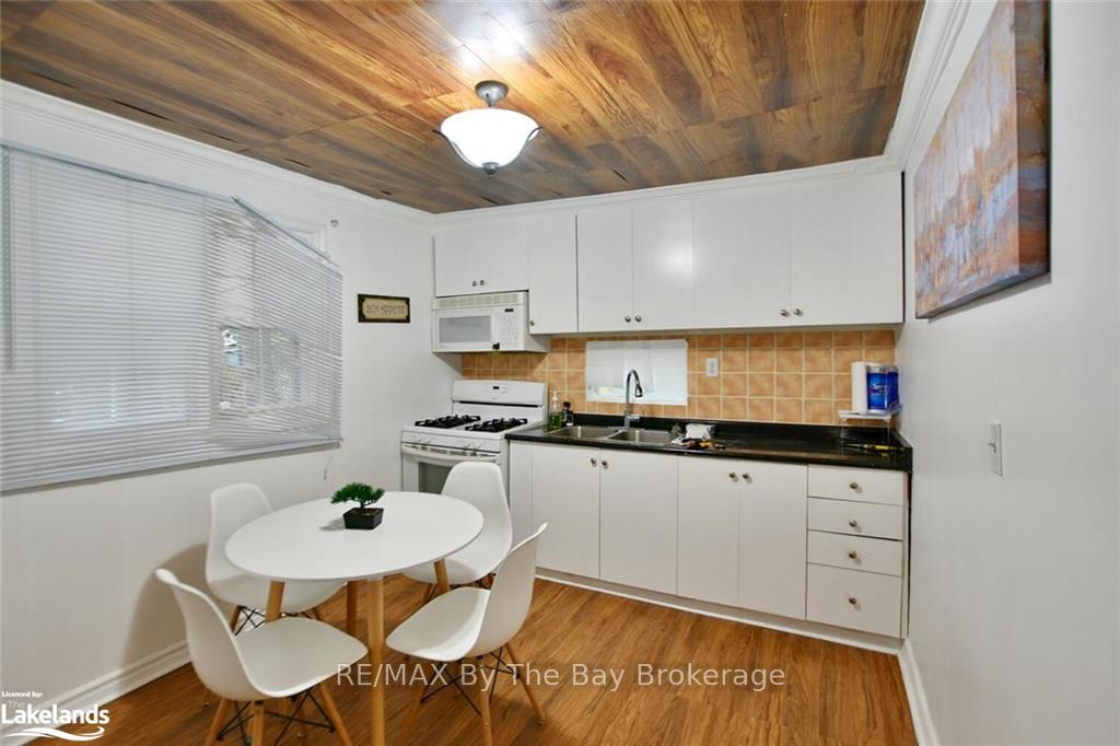 Photo 18 of 646 River Road E, Wasaga Beach — HOMEH