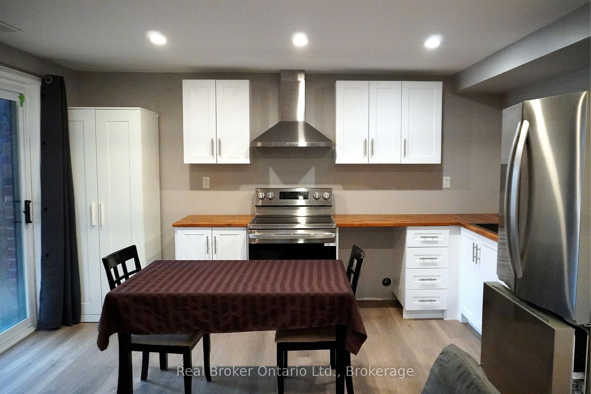 Photo 2 of Unit Lower Unit, 1009 Wright Drive, Midland — HOMEH