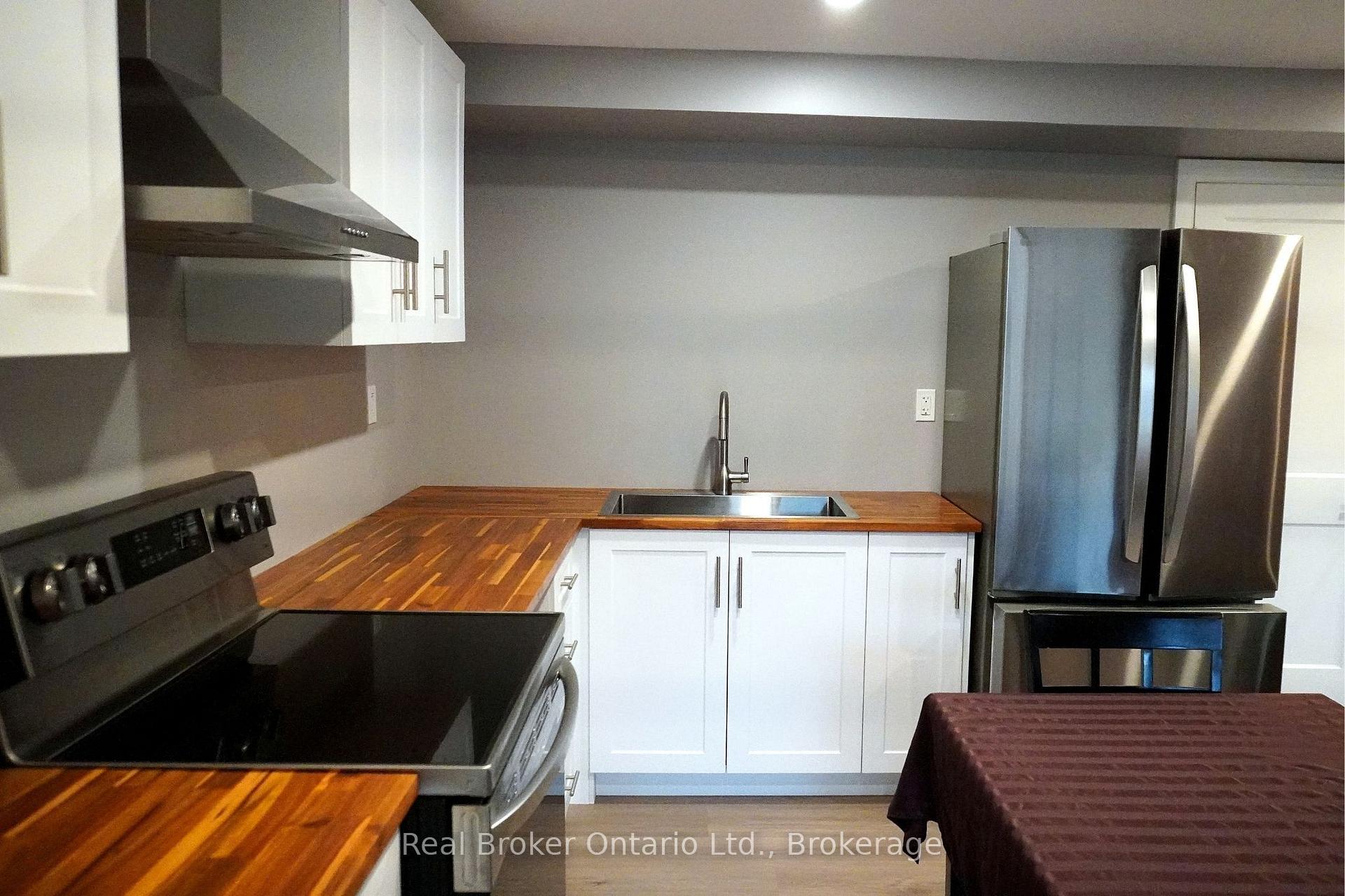 Photo 3 of Unit Lower Unit, 1009 Wright Drive, Midland — HOMEH