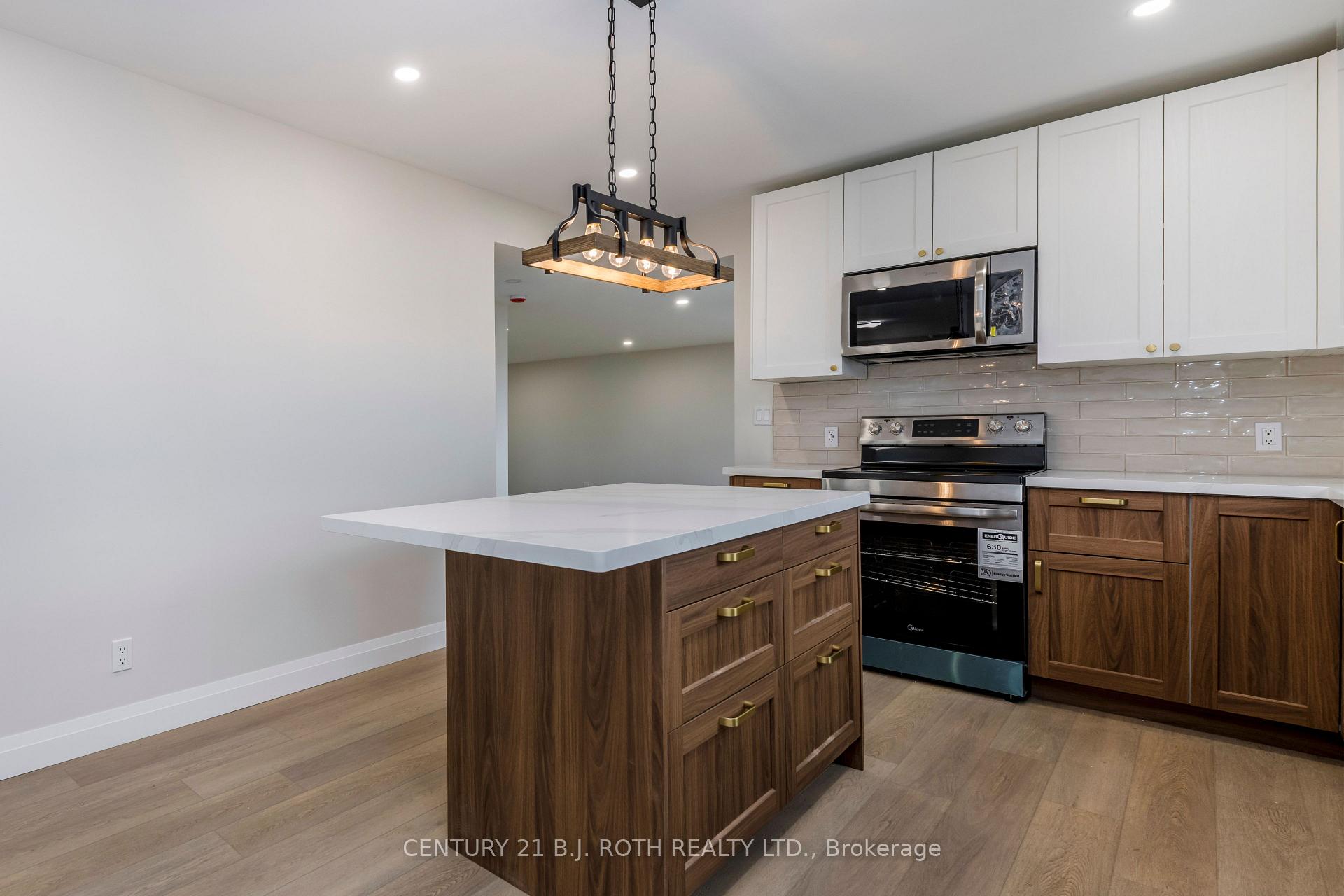 Photo 8 of 51 James Street E, Orillia — HOMEH