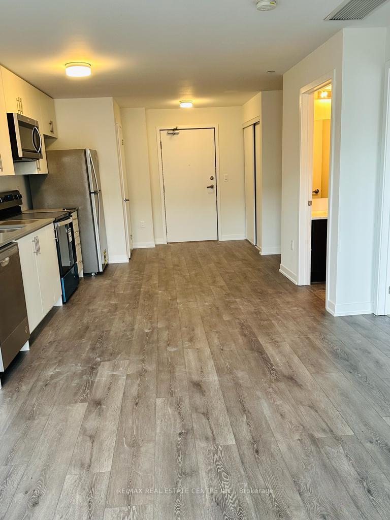 Photo 2 of Unit 410, 3401 Ridgeway Drive, Mississauga, Erin Mills — HOMEH