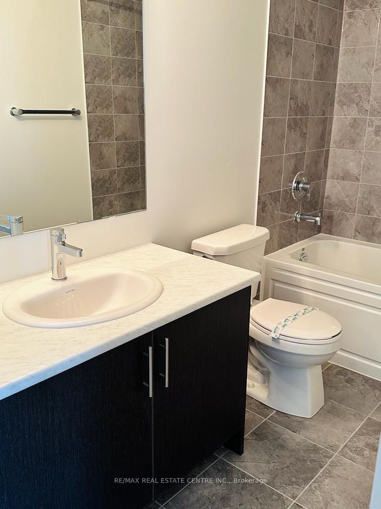 Photo 6 of Unit 410, 3401 Ridgeway Drive, Mississauga, Erin Mills — HOMEH