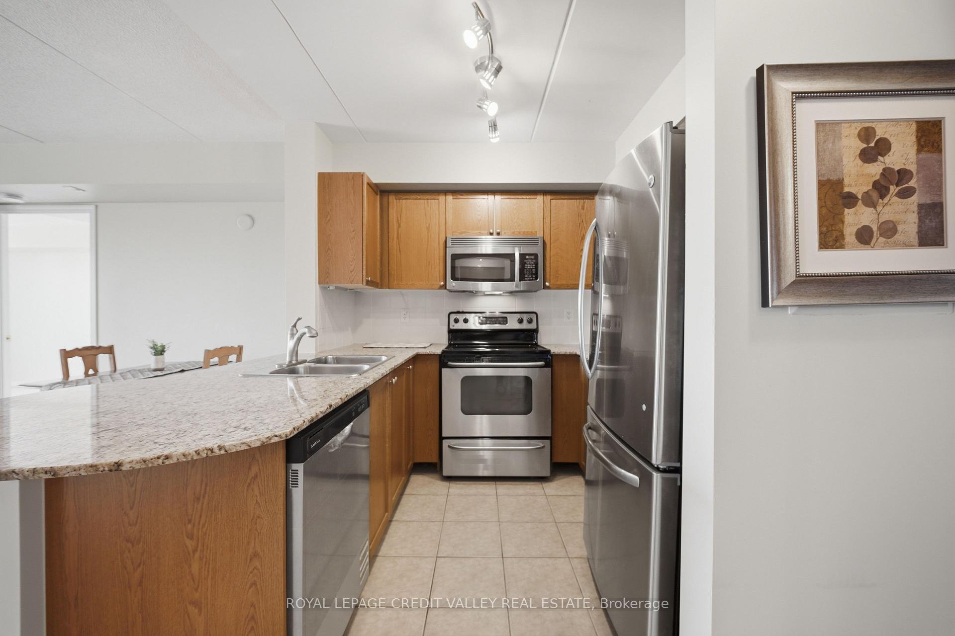 Photo 10 of Unit 204, 55 Via Rosedale, Brampton, Sandringham-Wellington — HOMEH