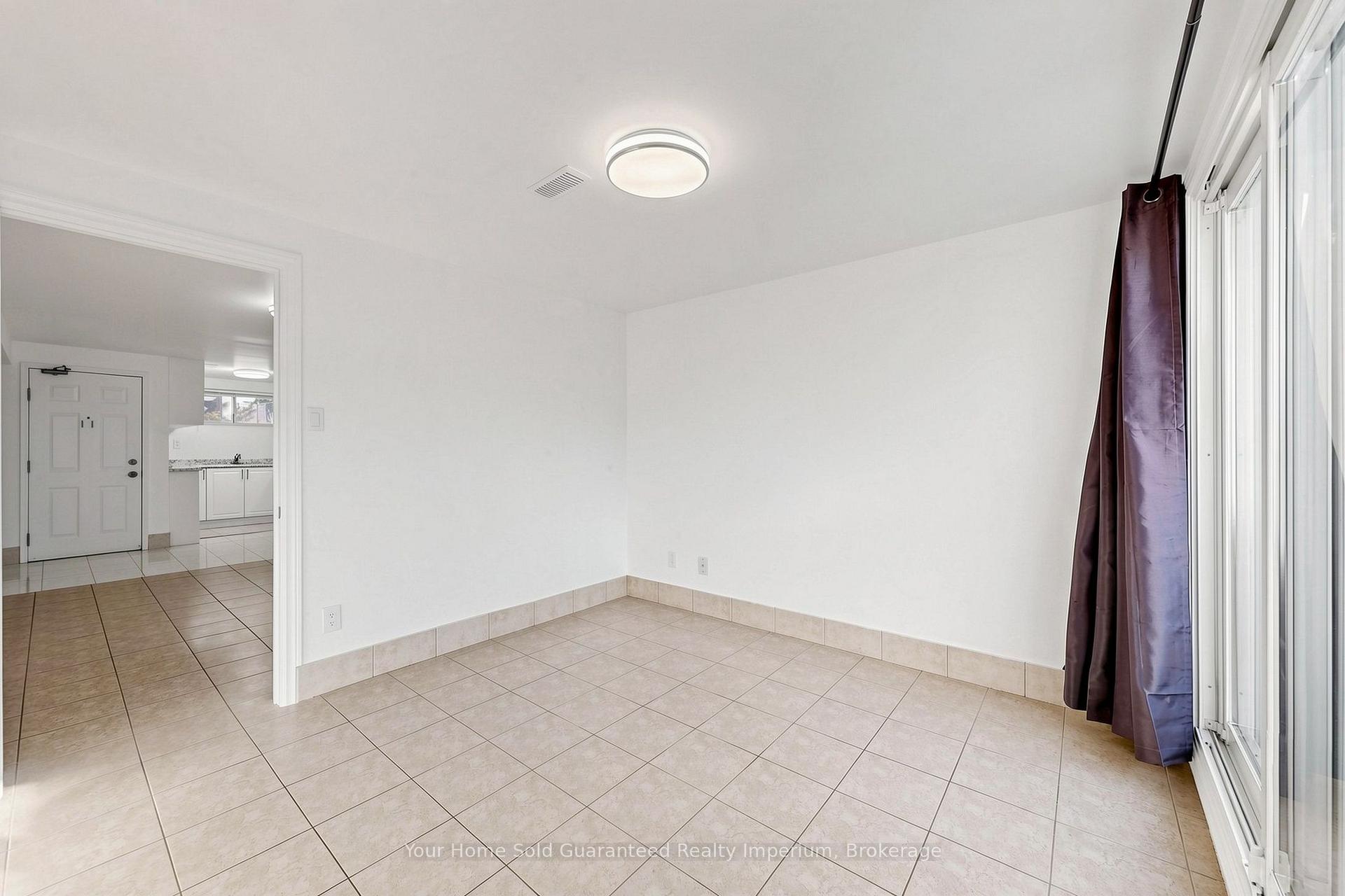 Photo 10 of 129 Melrose Street, Etobicoke, Mimico — HOMEH