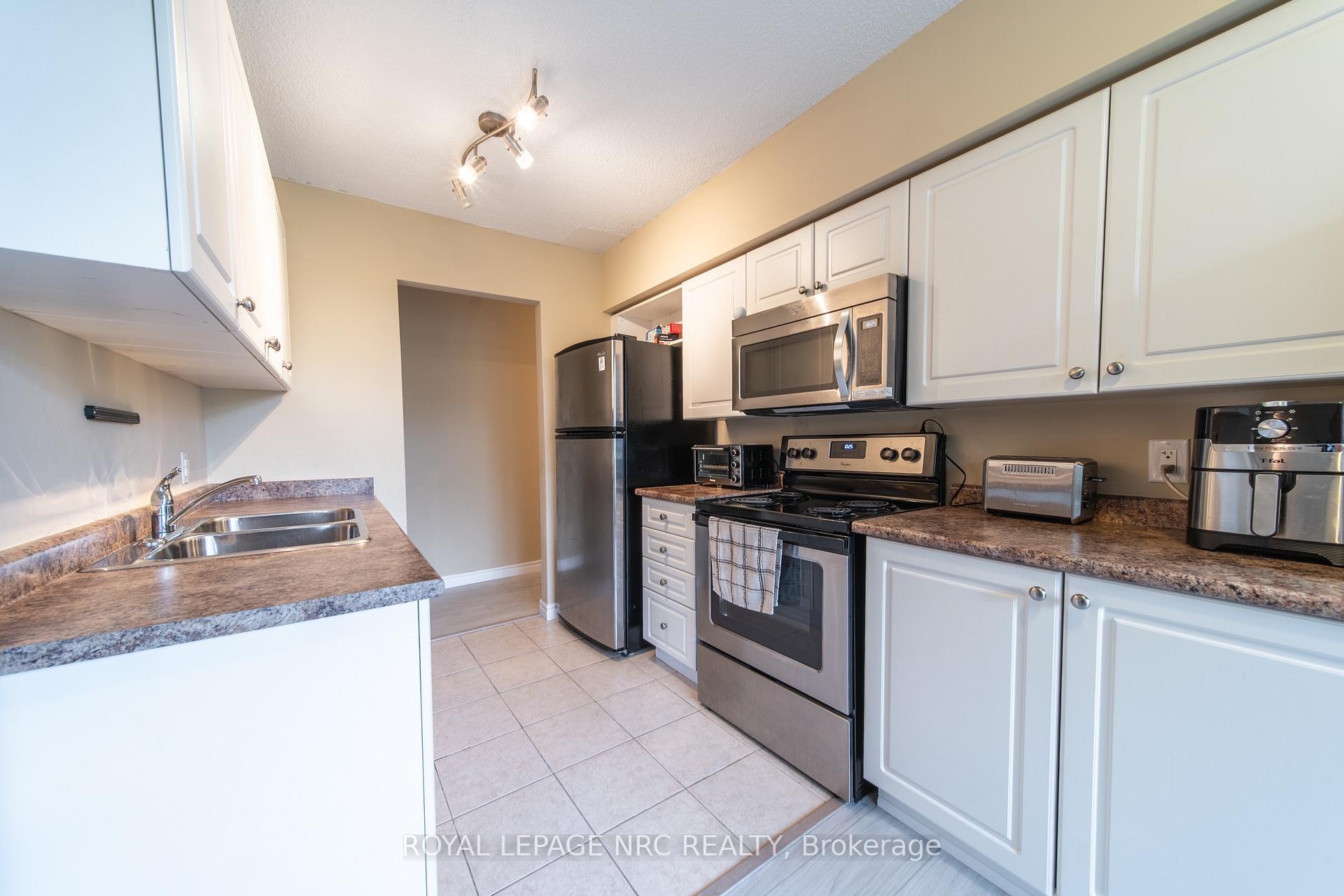 Photo 9 of Unit 301, 6400 Huggins Street, Niagara Falls, Stamford — HOMEH