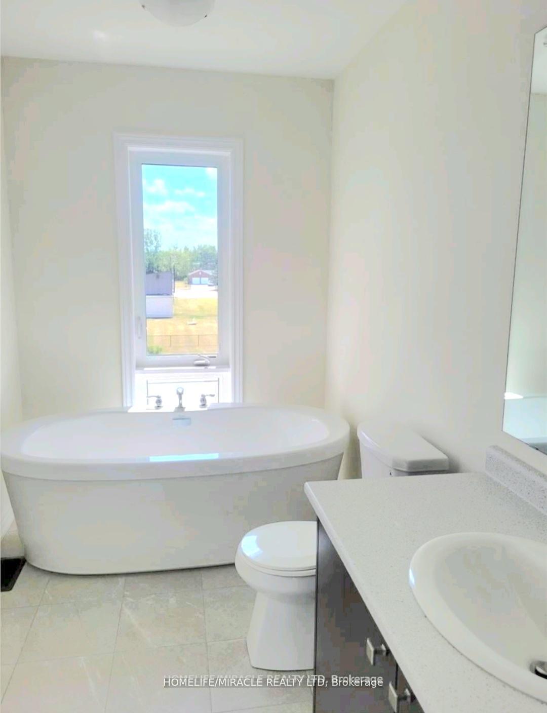Photo 5 of 64 Purple Sage Drive, Brampton, Bram East — HOMEH