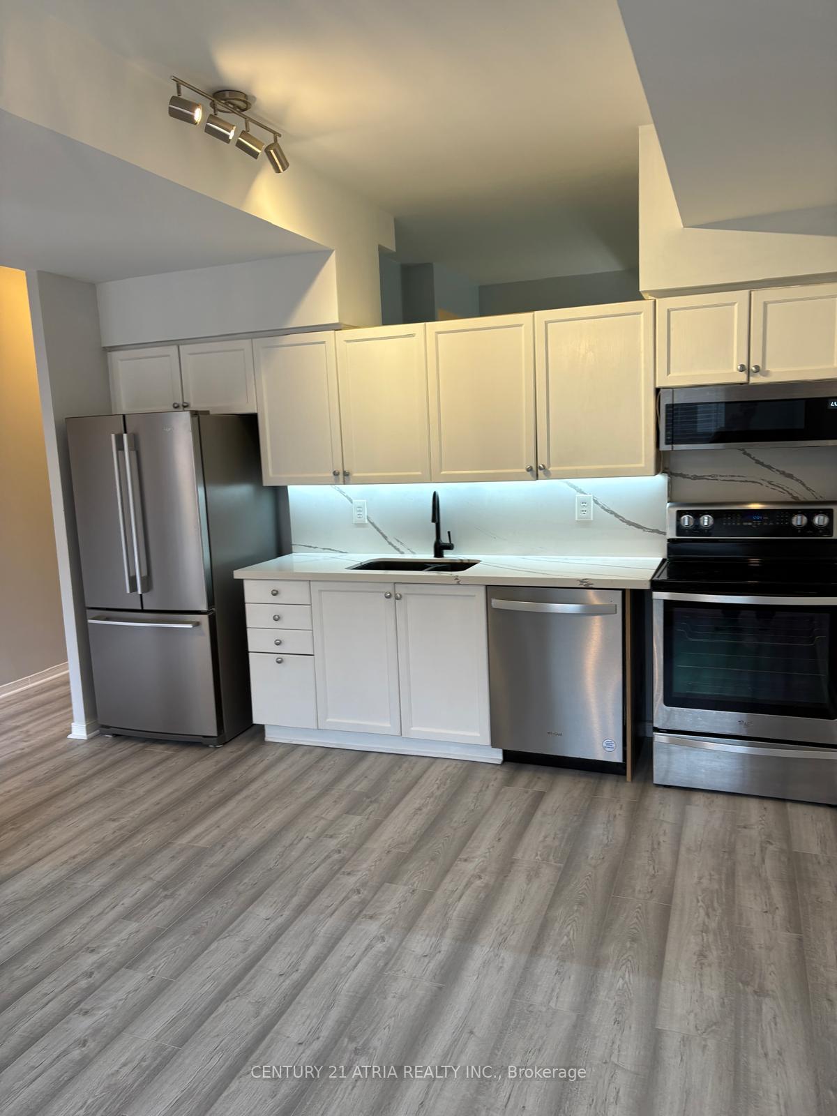 Photo 1 of Unit 103, 140 Bathurst Street, Toronto, Waterfront Communities — HOMEH