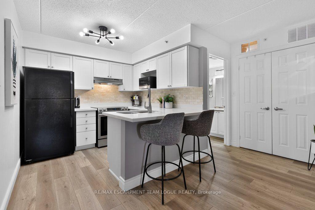 Photo 11 of Unit 306, 2065 Appleby Line, Burlington, Orchard — HOMEH