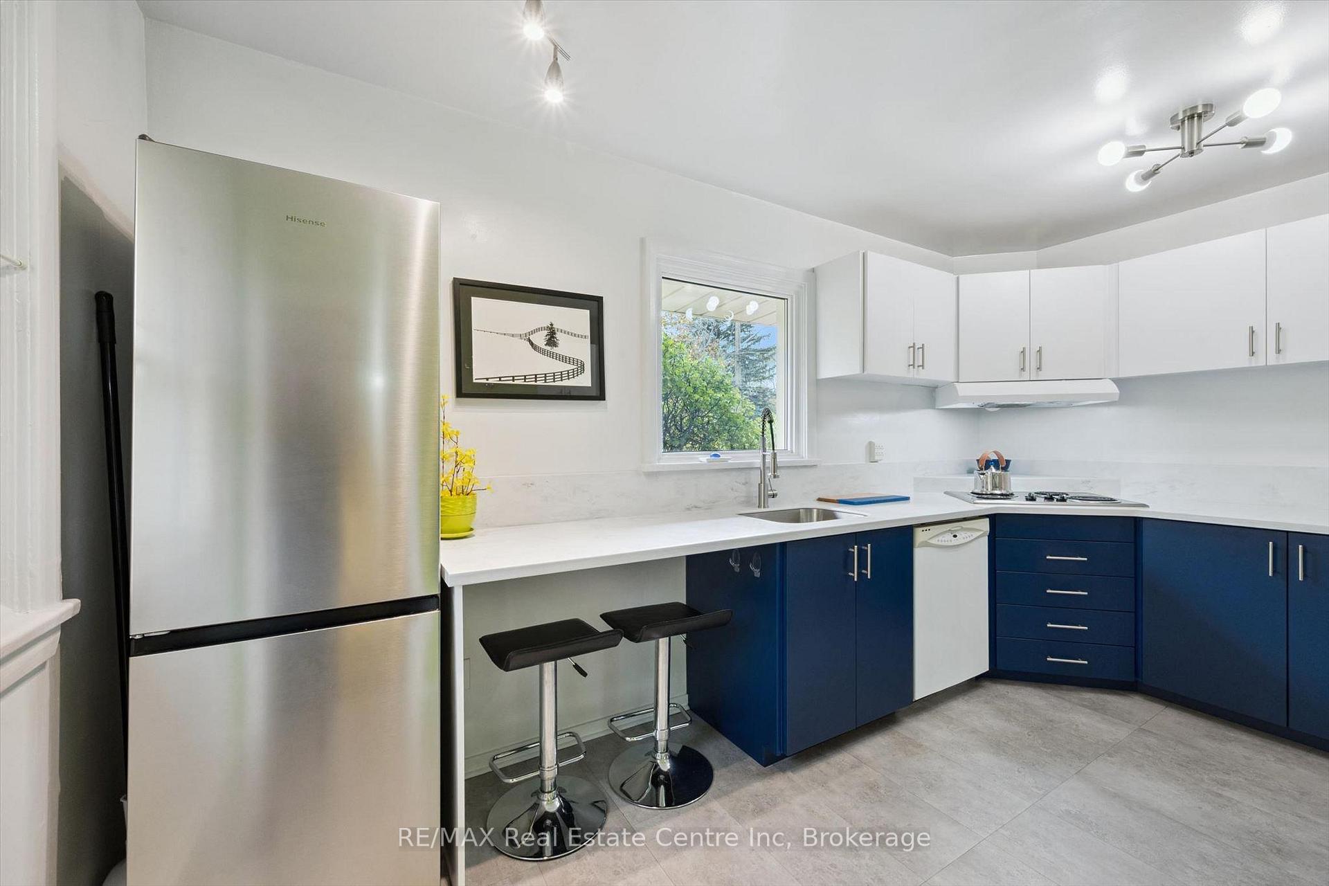 Photo 10 of 1 Cadillac Drive, Guelph, St. George's — HOMEH