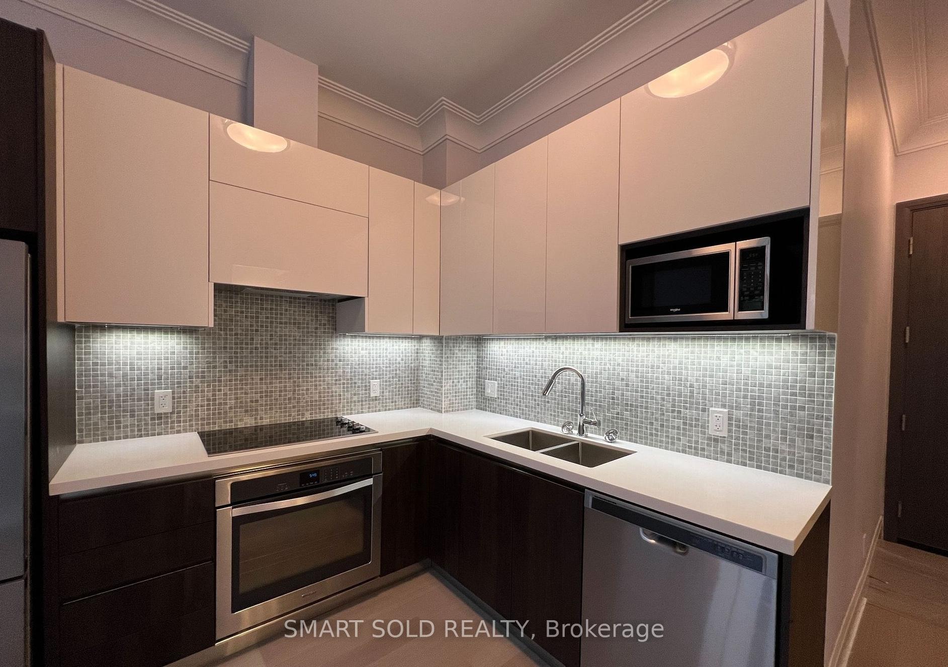 Photo 3 of Unit 103, 25 Water Walk Drive, Markham, Unionville — HOMEH