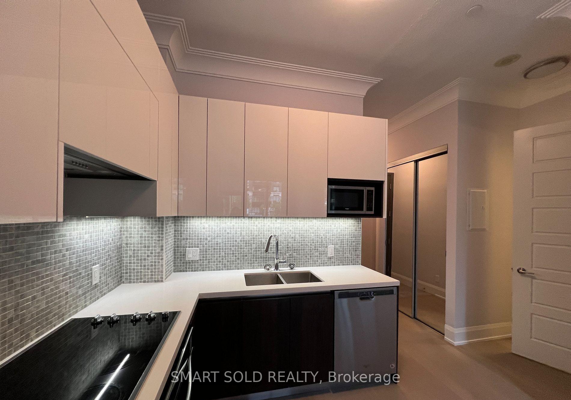 Photo 4 of Unit 103, 25 Water Walk Drive, Markham, Unionville — HOMEH