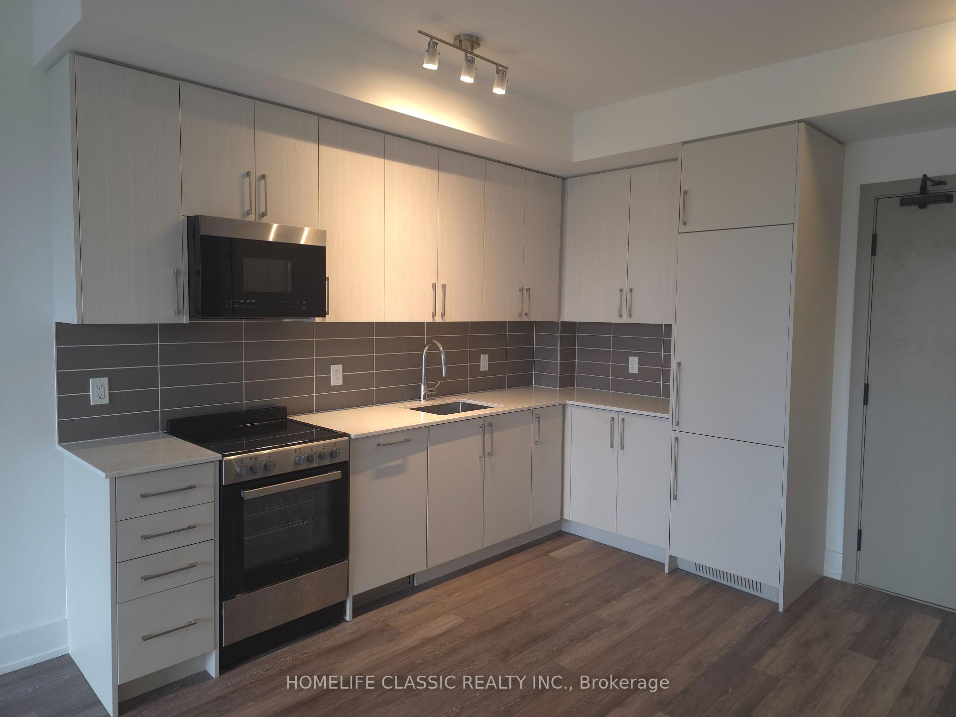 Photo 3 of Unit 419, 2075 King Road, King, King City — HOMEH