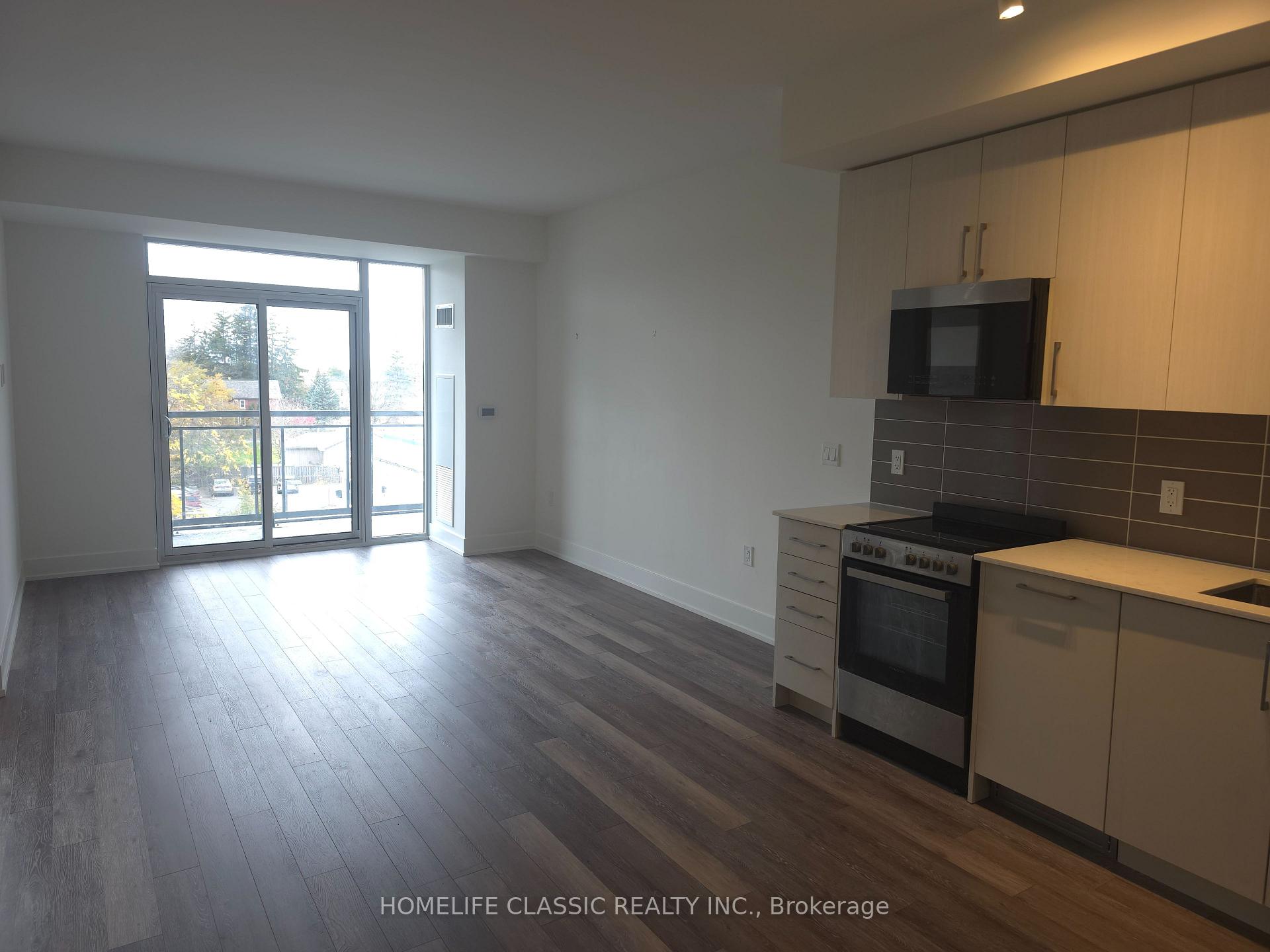 Photo 4 of Unit 419, 2075 King Road, King, King City — HOMEH