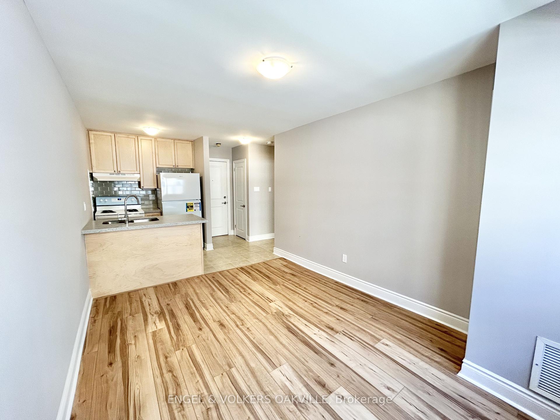 Photo 3 of Unit 204, 11 Thirty Third Street, Etobicoke, Long Branch — HOMEH
