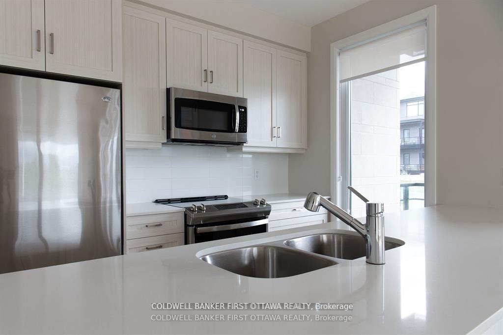 Photo 3 of Unit 104, 150 Boundstone Way, Ottawa, Kanata - Kanata Lakes/Heritage Hills — HOMEH