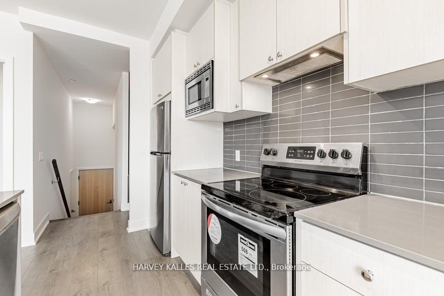 Photo 11 of Unit 4, 60 George Butchart Drive, North York, Downsview-Roding-CFB — HOMEH