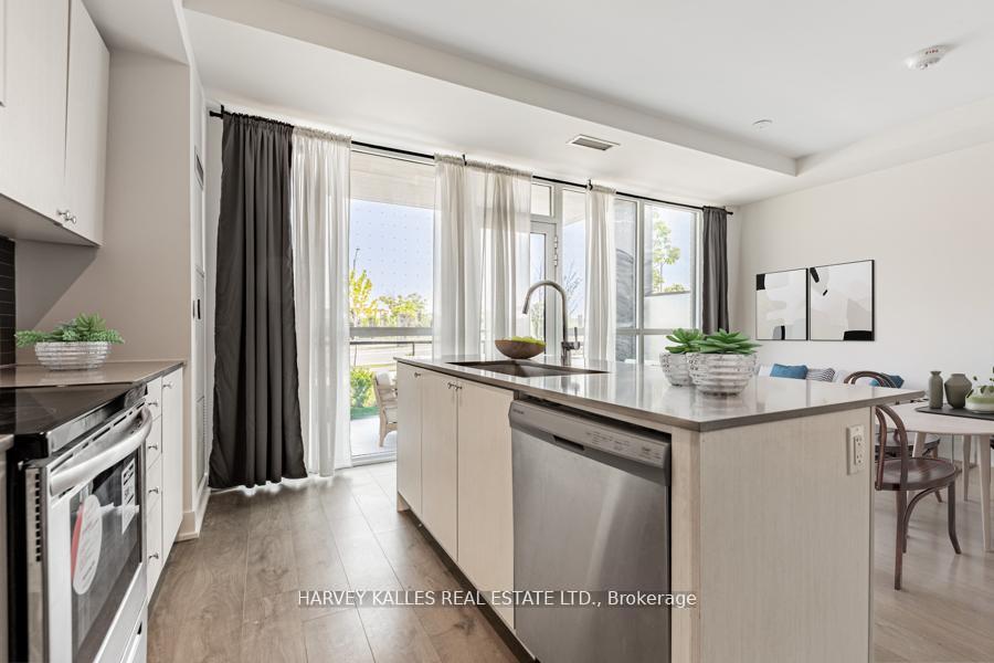 Photo 12 of Unit 4, 60 George Butchart Drive, North York, Downsview-Roding-CFB — HOMEH