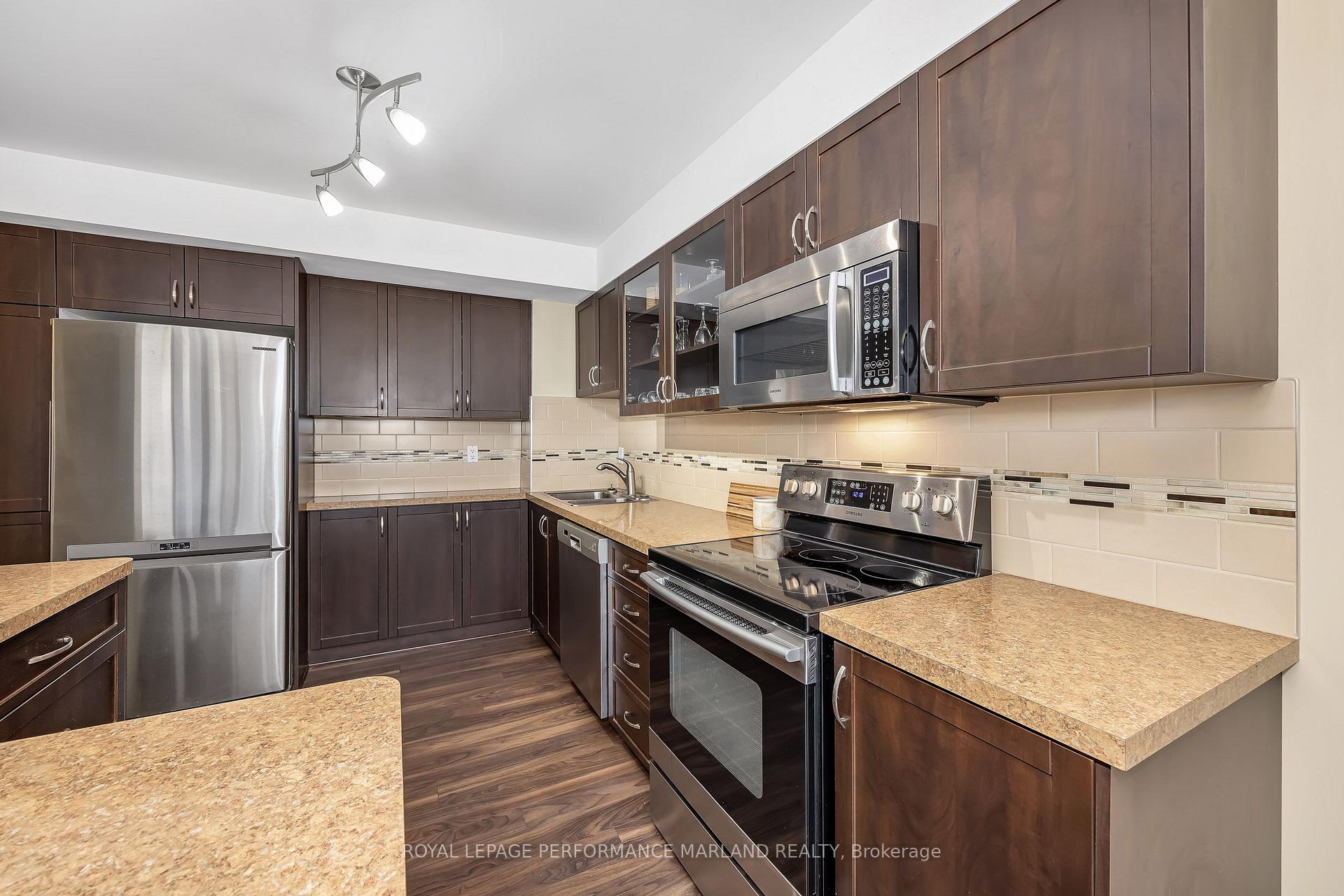 Photo 5 of Unit 706, 2759 Carousel Crescent, Ottawa, Emerald Woods/Sawmill Creek — HOMEH