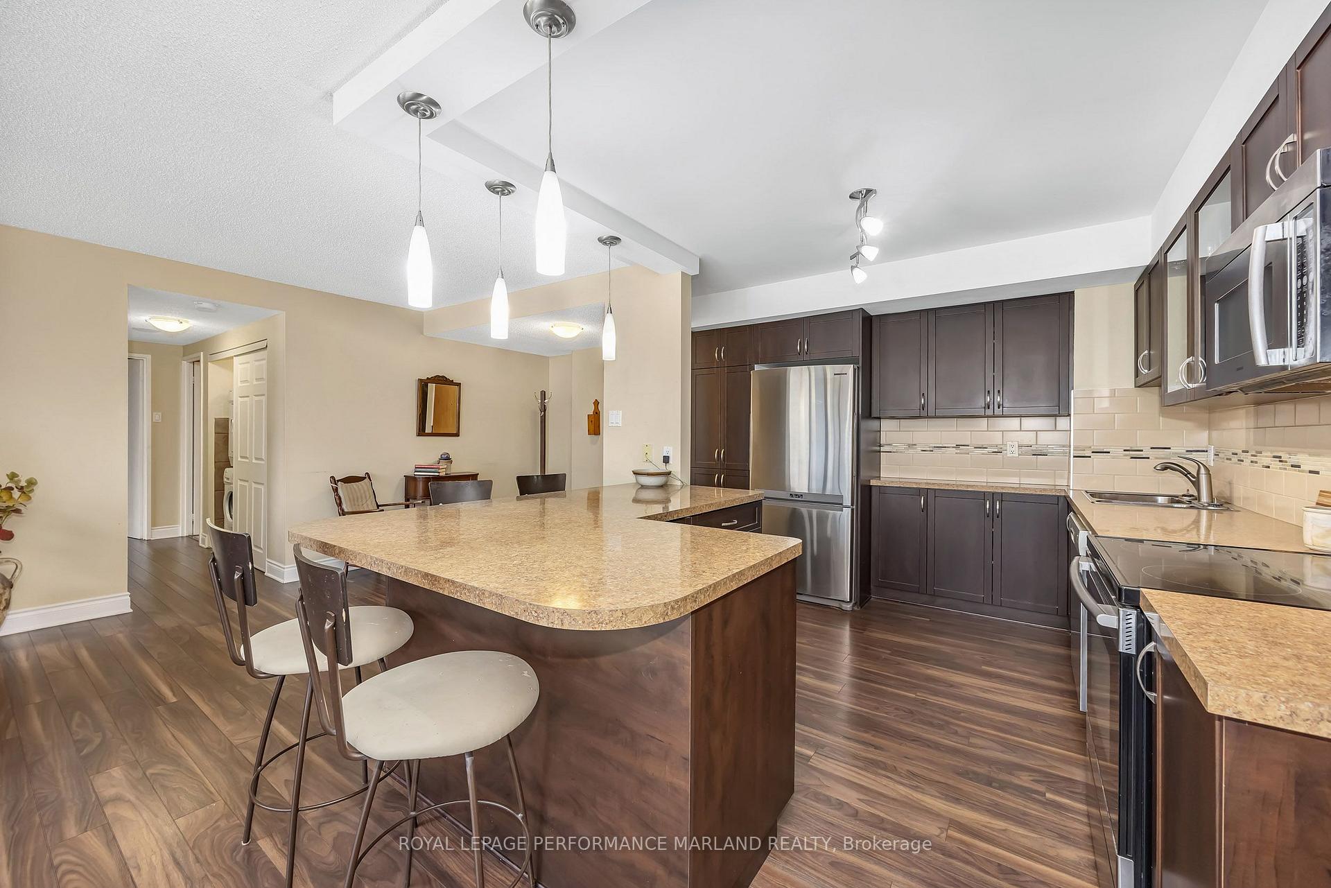 Photo 6 of Unit 706, 2759 Carousel Crescent, Ottawa, Emerald Woods/Sawmill Creek — HOMEH