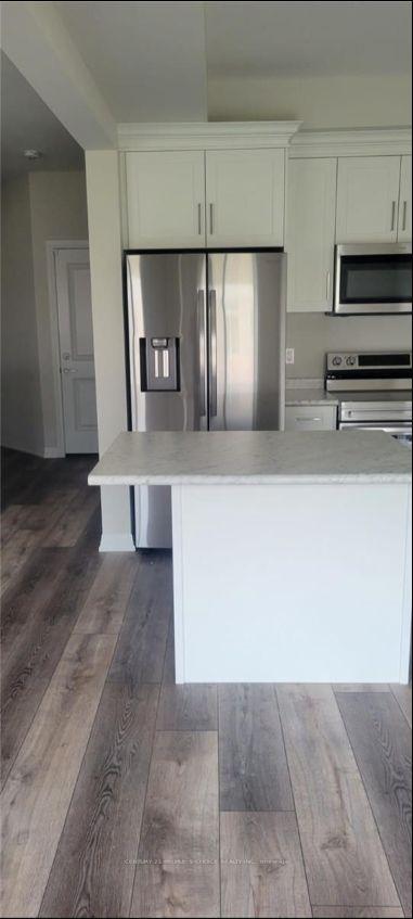 Photo 4 of 7413 Matteo Drive, Niagara Falls, Brown — HOMEH