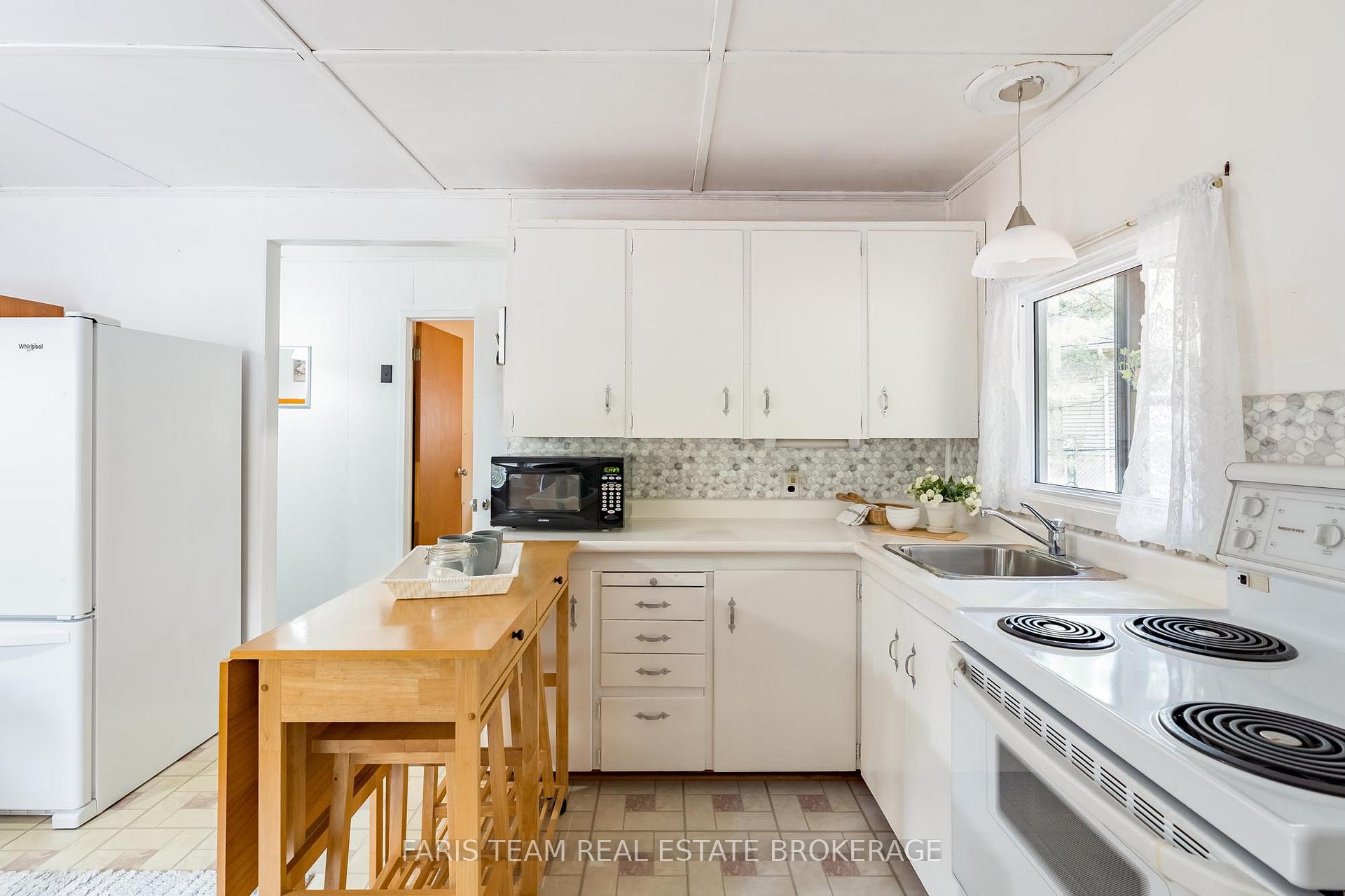 Photo 8 of 14 Chez Nous Avenue, Tiny, Rural Tiny — HOMEH