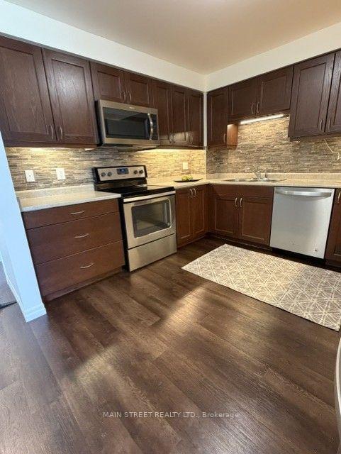 Photo 12 of Unit 218, 429 William Graham Drive, Aurora, Rural Aurora — HOMEH