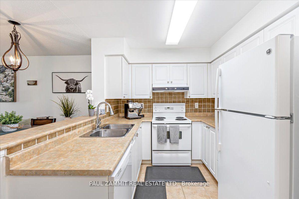 Photo 4 of Unit 306, 39 Oneida Crescent, Richmond Hill, Langstaff — HOMEH