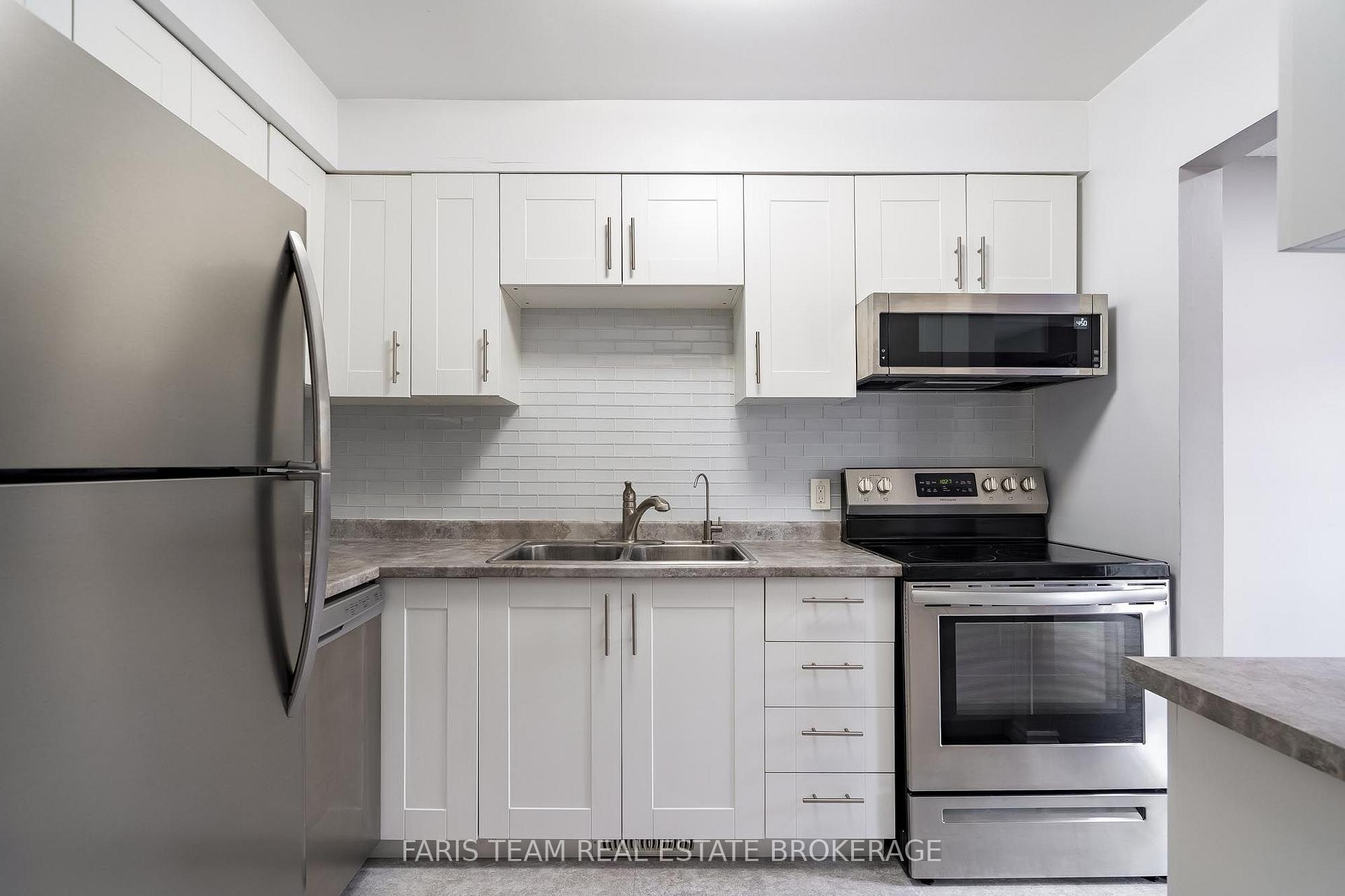 Photo 6 of Unit 6, 261 Rose Street, Barrie, Wellington — HOMEH