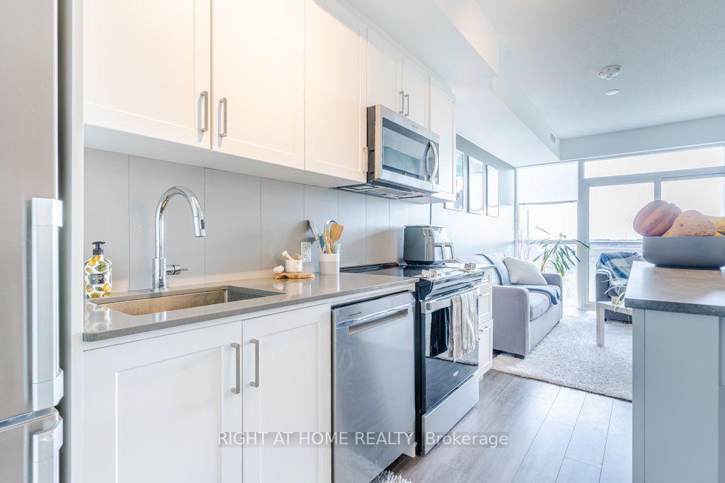 Photo 8 of Unit 409, 681 Yonge Street, Barrie, Painswick South — HOMEH