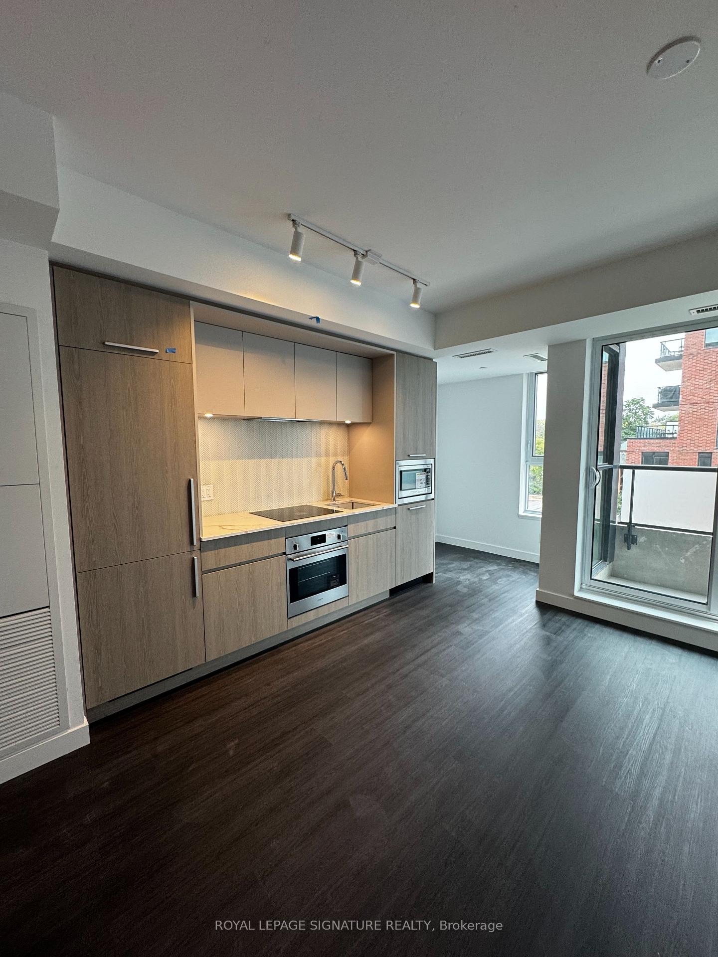 Photo 5 of Unit 409, 180 Alberta Avenue, Toronto, Oakwood Village — HOMEH