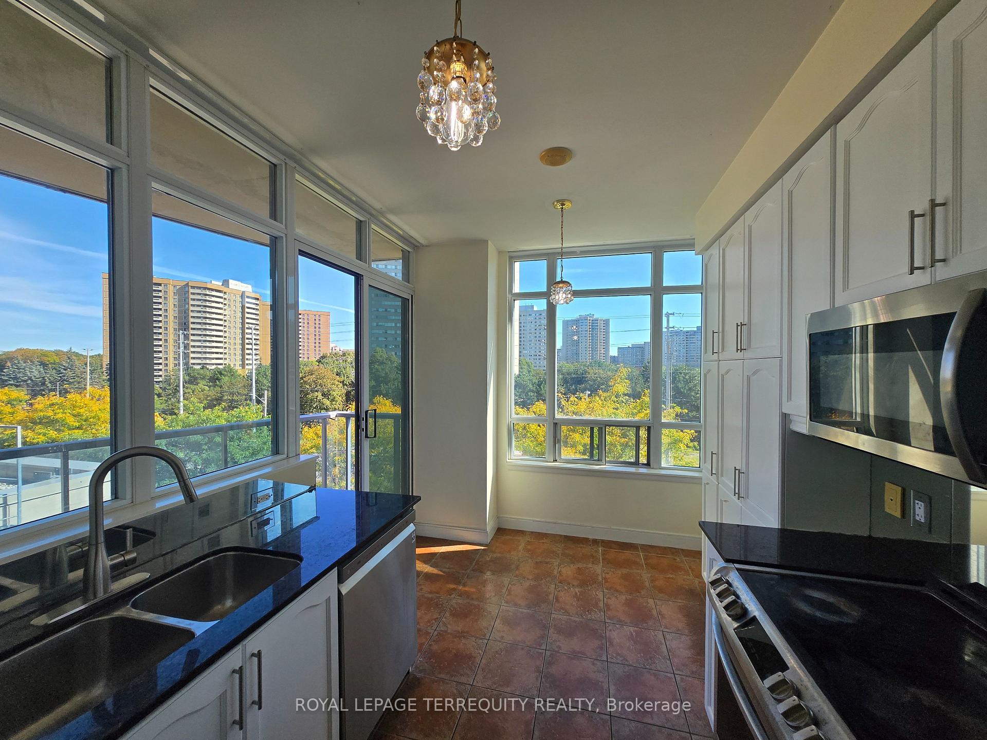 Photo 4 of Unit 403, 70 Absolute Avenue, Mississauga, City Centre — HOMEH