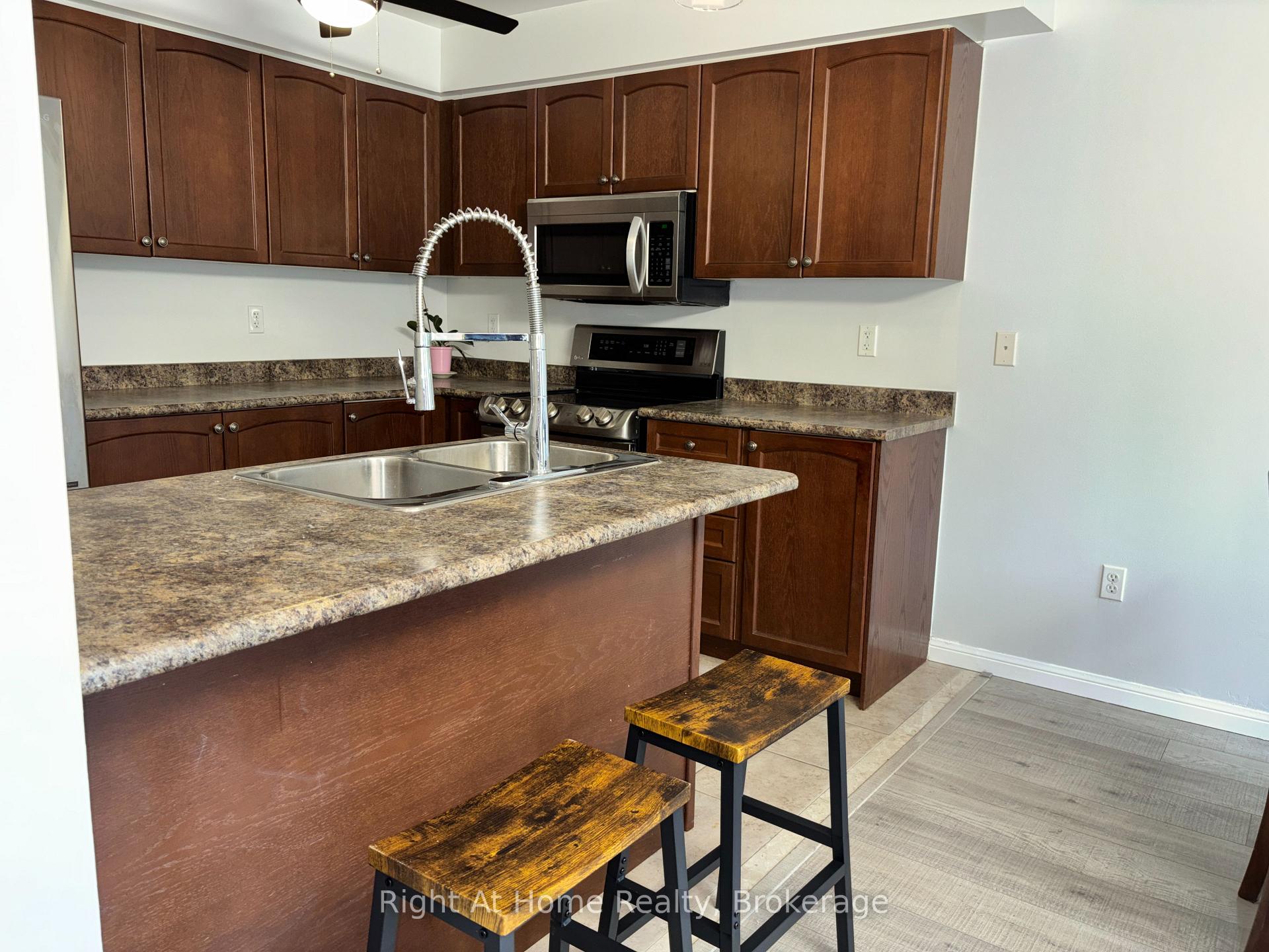 Photo 22 of Unit 19, 23 Connell Lane, Clarington, Bowmanville — HOMEH
