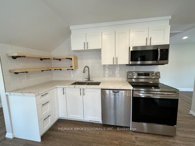 Photo 2 of Unit 1, 213 Pine Street, Whitby, Downtown Whitby — HOMEH