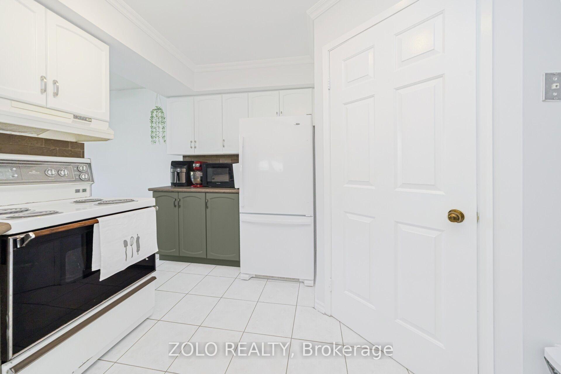 Photo 11 of Unit 105, 310 Mill Street S, Brampton, Brampton South — HOMEH