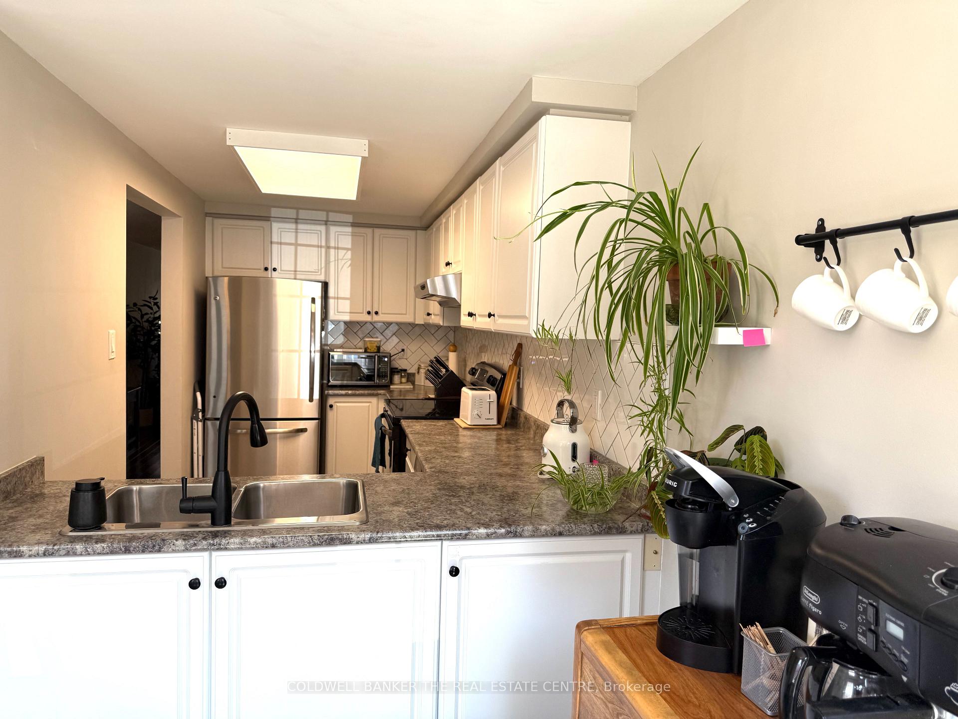 Photo 11 of Unit 107, 2055 Walkers Line, Burlington, Rose — HOMEH
