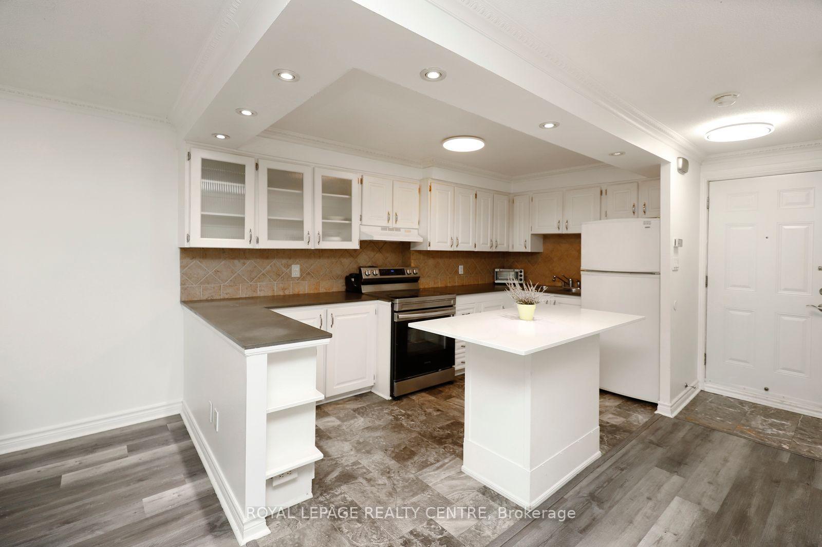 Photo 5 of Unit 103, 3040 Constitution Boulevard, Mississauga, Applewood — HOMEH