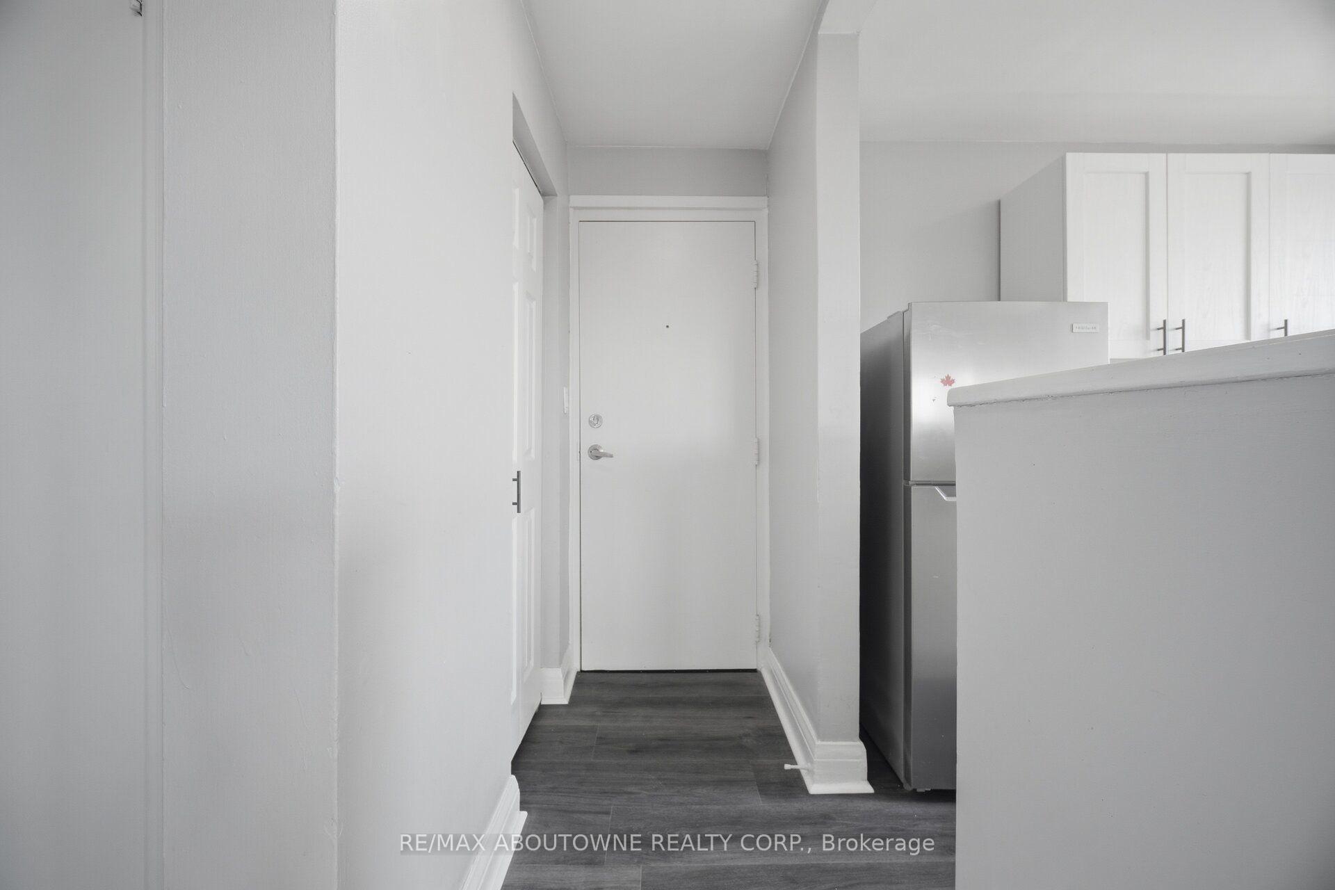 Photo 4 of Unit 1, 133 North Service Road E, Oakville, College Park — HOMEH