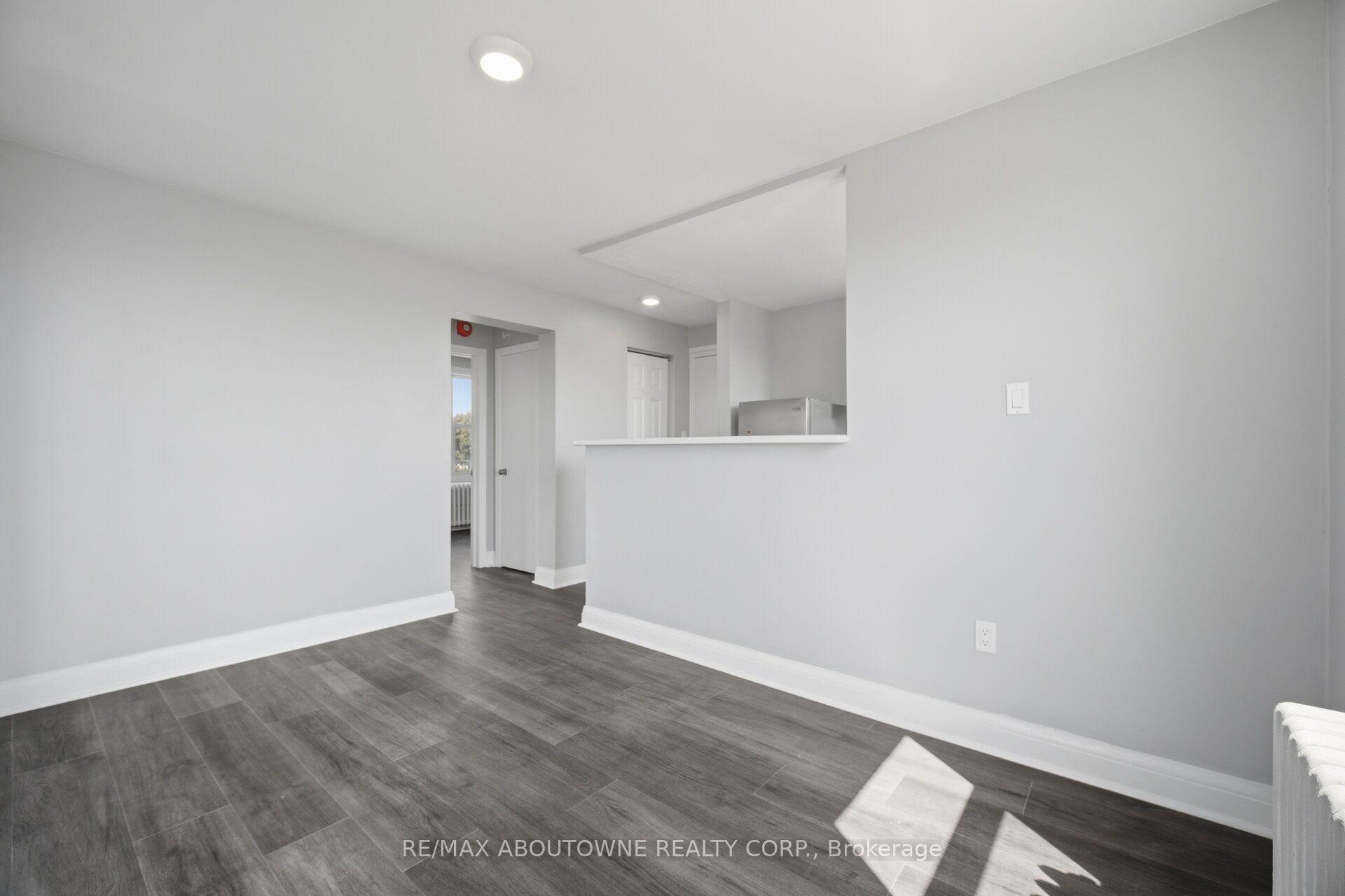 Photo 10 of Unit 1, 133 North Service Road E, Oakville, College Park — HOMEH