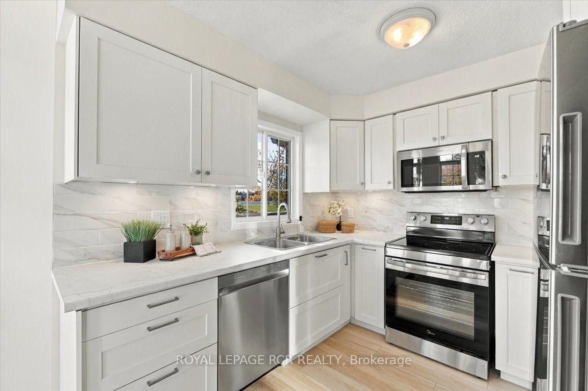 Photo 5 of 31 Montgomery Boulevard, Orangeville — HOMEH