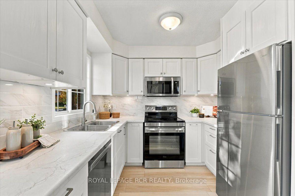 Photo 6 of 31 Montgomery Boulevard, Orangeville — HOMEH