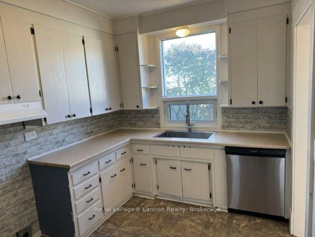Photo 5 of 1711 Donald Street E, Thunder Bay, McKeller Park — HOMEH
