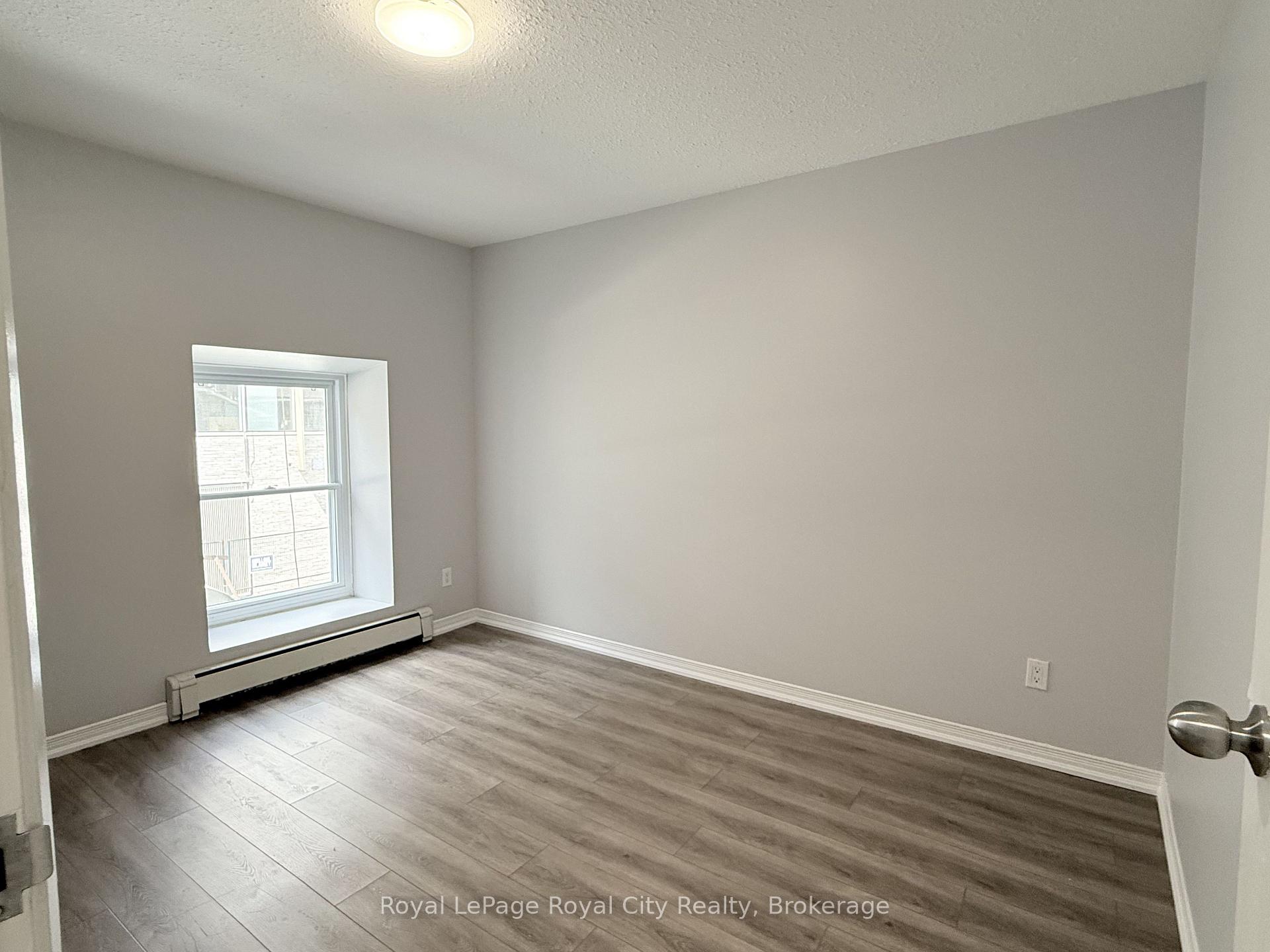 Photo 4 of Unit 2, 116 Wyndham Street, Guelph, Downtown — HOMEH