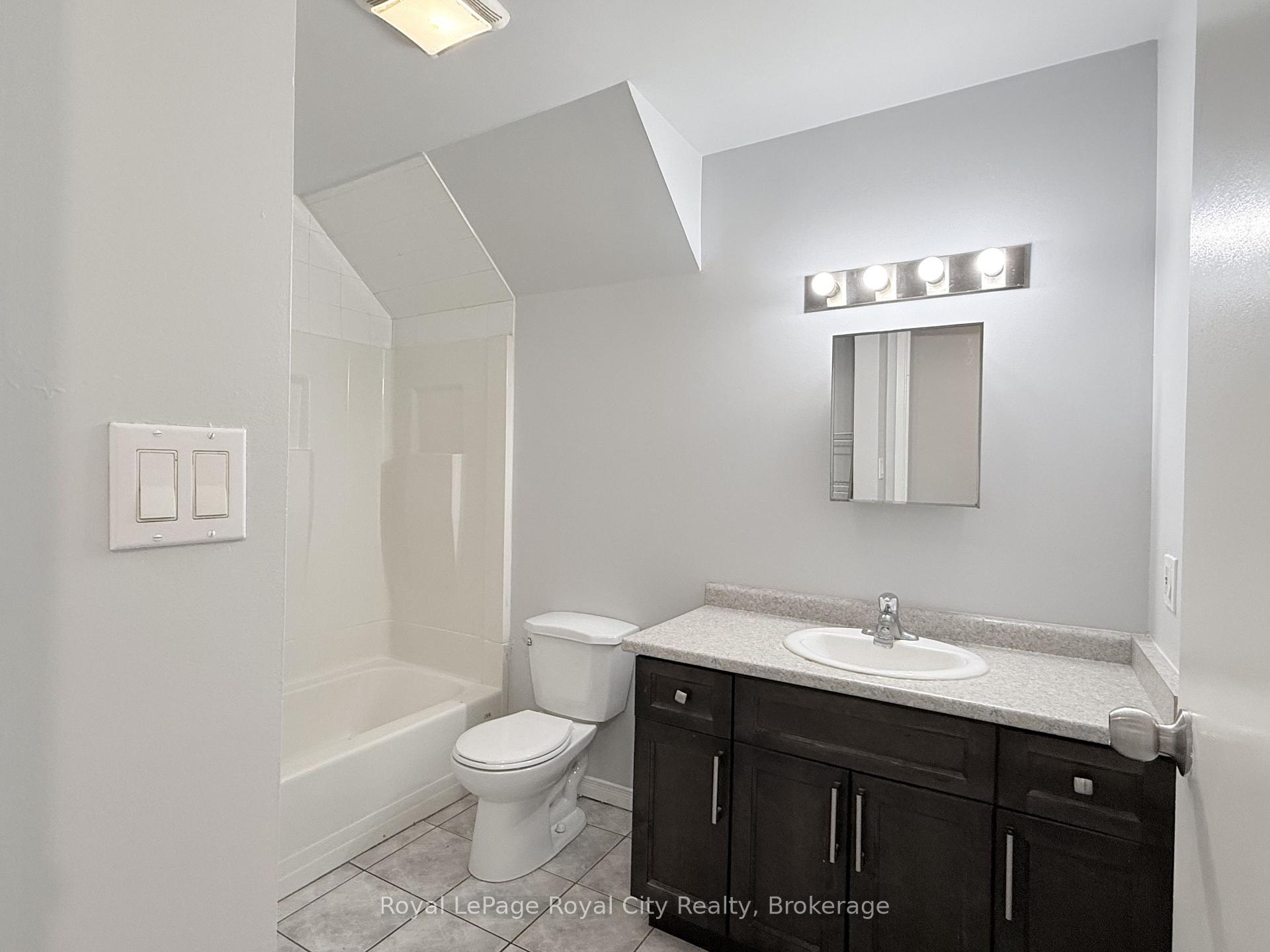 Photo 10 of Unit 2, 116 Wyndham Street, Guelph, Downtown — HOMEH