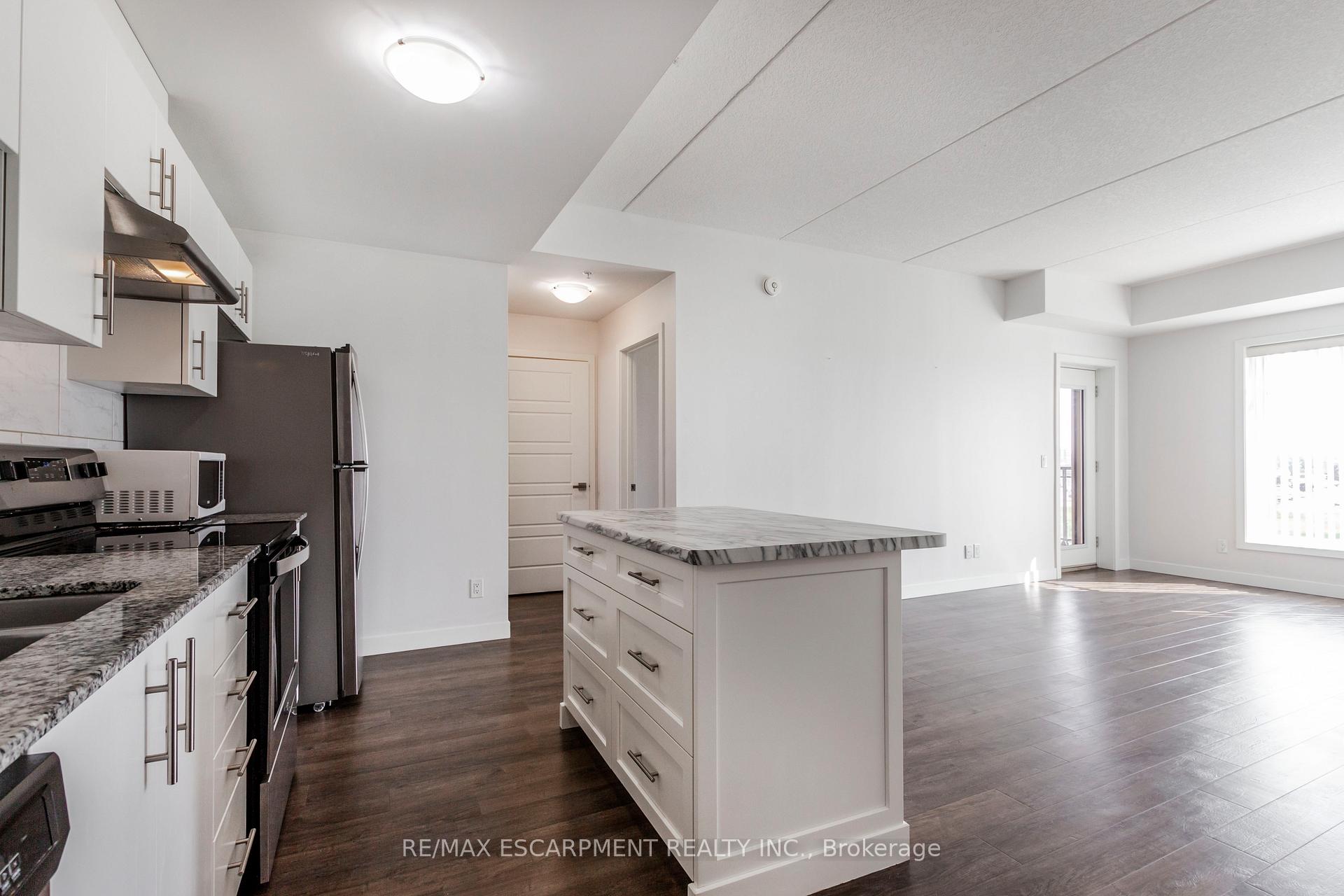 Photo 9 of Unit 306, 175 Commonwealth Street, Kitchener, Larentian West — HOMEH