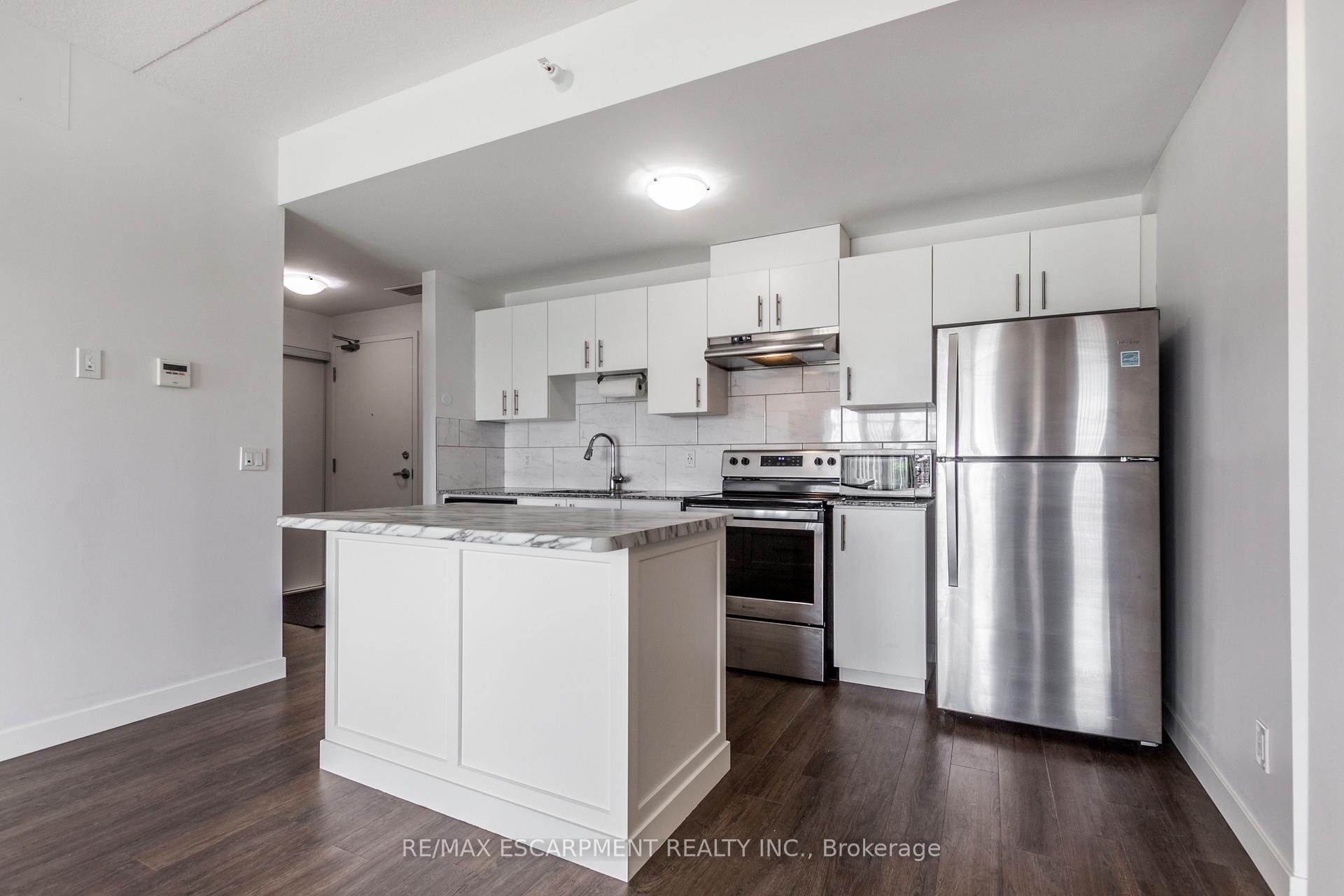 Photo 11 of Unit 306, 175 Commonwealth Street, Kitchener, Larentian West — HOMEH