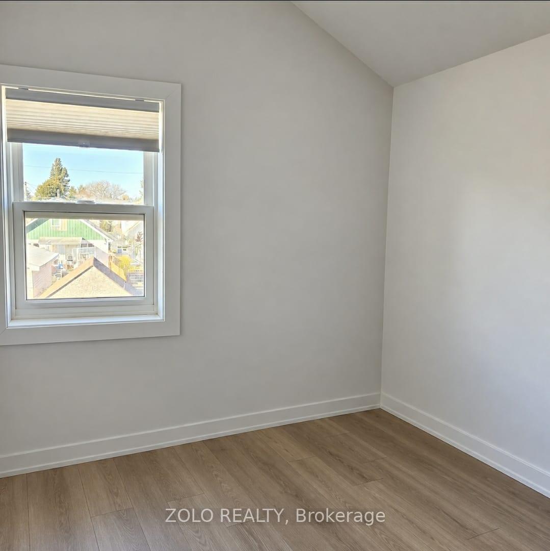 Photo 6 of Unit Upper unit, 309 Cedar Street N, Timmins, TNE - Central — HOMEH