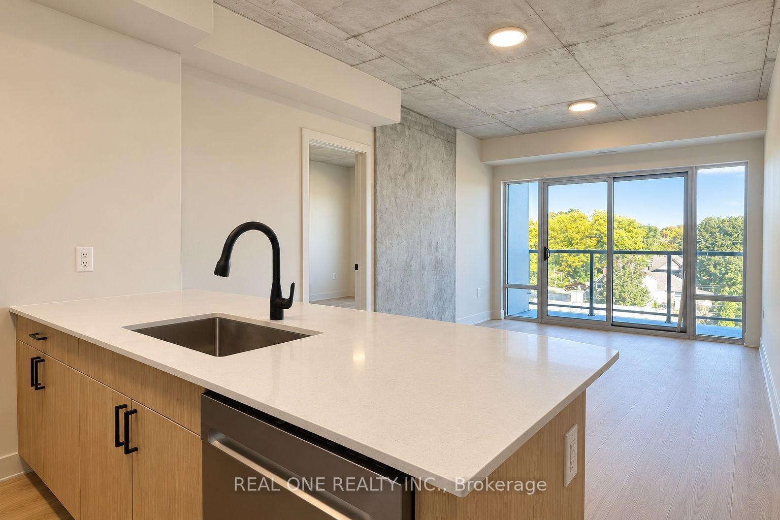 Photo 10 of Unit 409, 810 King Street W, Hamilton, Westdale — HOMEH