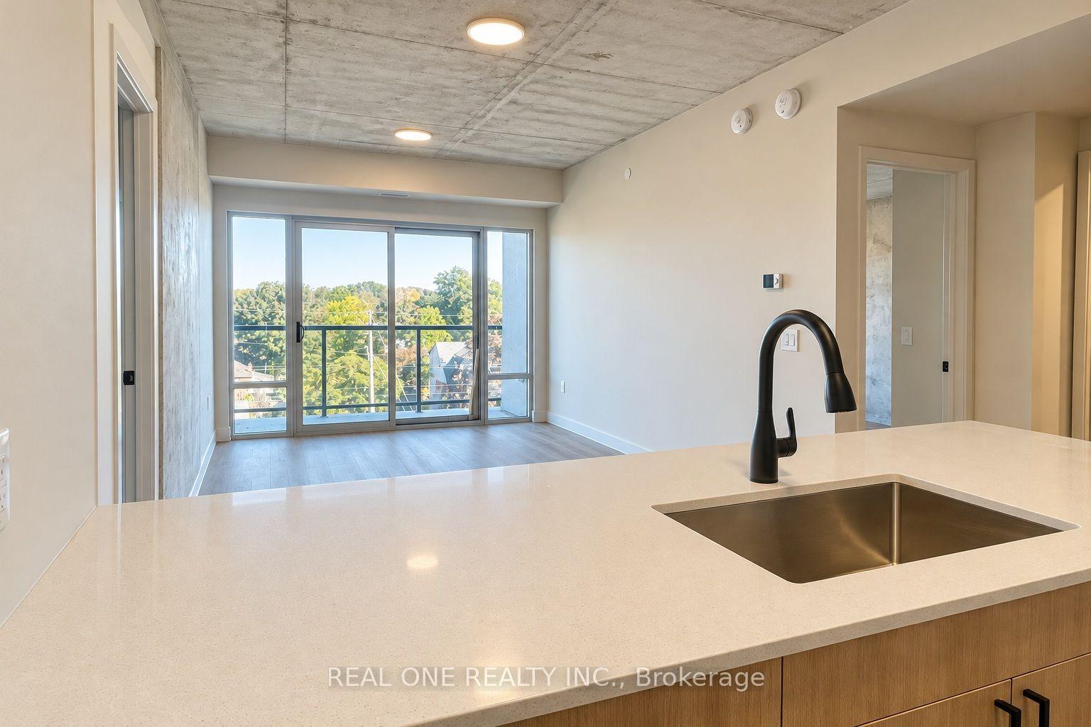 Photo 12 of Unit 409, 810 King Street W, Hamilton, Westdale — HOMEH