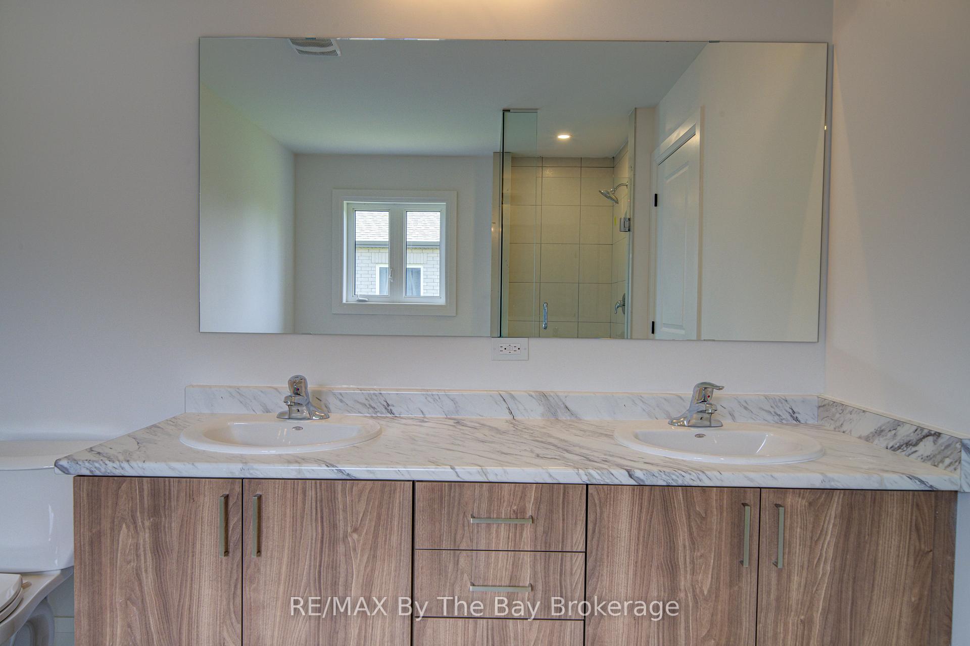 Photo 21 of 56 Amber Drive, Wasaga Beach — HOMEH